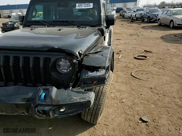 2022 Jeep Wrangler 4xe Unlimited Sahara High Altitude with VIN 1C4JJXP63NW239633, listed as a Copart auction lot 48973285 with NaN miles and Salvage Title. Bid and sale history available at carsss.com. Image 11.