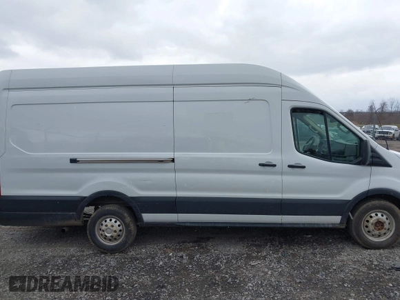 2023 Ford Transit Cargo with VIN 1FTBR3U89PKA07396, listed as a IAAI auction lot 41878907 with 103,402 mi miles and . Bid and sale history available at DreamBid. Image 12.