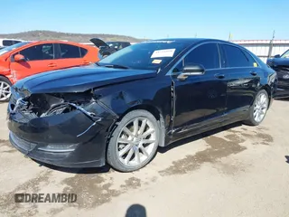 2015 Lincoln MKZ with VIN 3LN6L2G93FR619701, listed as a IAAI auction lot 41794410 with 77,201 mi miles. Bid and sale history available at carsss.com. Image 2.
