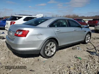 2012 Ford Taurus SEL z VIN 1FAHP2HW7CG138459, wystawiony jako Copart lot #53170075 z przebiegiem 194 617 mil mil oraz Czysty tytuł • Clean title. Historia ofert i sprzedaży dostępna na DreamBid. Obrazek 3.