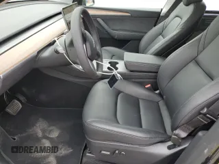 2024 Tesla Model Y Long Range with VIN 7SAYGDEE9RF069801, listed as a Copart auction lot 60857145 with 18,808 mi miles and Salvage title. Bid and sale history available at DreamBid. Image 7.