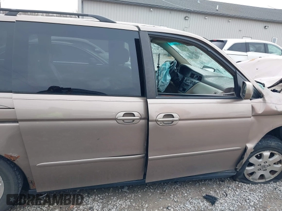 2004 Honda Odyssey EX z VIN 5FNRL18634B004127, wystawiony jako IAAI lot #41854878 z przebiegiem 242 601 mil mil oraz . Historia ofert i sprzedaży dostępna na DreamBid. Obrazek 13.
