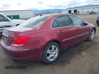2006 Acura RL z VIN JH4KB16566C005642, wystawiony jako IAAI lot #42613927 z przebiegiem 201 601 mil mil oraz . Historia ofert i sprzedaży dostępna na DreamBid. Obrazek 4.