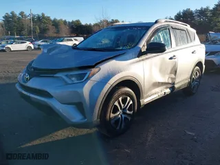 2016 Toyota RAV4 LE with VIN 2T3BFREV2GW477230, listed as a IAAI auction lot 41144507 with 82,425 mi miles. Bid and sale history available at carsss.com. Image 18.