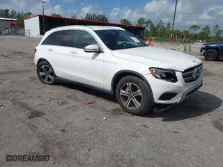 2019 Mercedes-Benz GLC with VIN WDC0G4JBXKV151737, listed as a IAAI auction lot 41914532 with 73,749 mi miles. Bid and sale history available at carsss.com. Image 1.