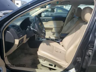 2010 Mercury Milan Premier with VIN 3MEHM0JA2AR628186, listed as a Copart auction lot 71458584 with 135,612 mi miles and Salvage Title. Bid and sale history available at carsss.com. Image 7.