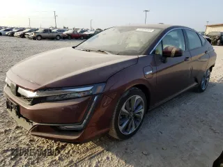 2021 Honda Clarity Touring z VIN JHMZC5F32MC000842, wystawiony jako Copart lot #60568353 z przebiegiem 4 687 mil mil oraz . Historia ofert i sprzedaży dostępna na DreamBid. Obrazek 1.