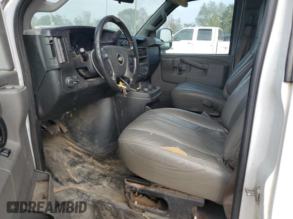 2017 Chevrolet Express Cargo Van with VIN 1GCWGBFG9H1338685, listed as a Copart auction lot 82253254 with 140,434 mi miles and Clean Title. Bid and sale history available at carsss.com. Image 7.