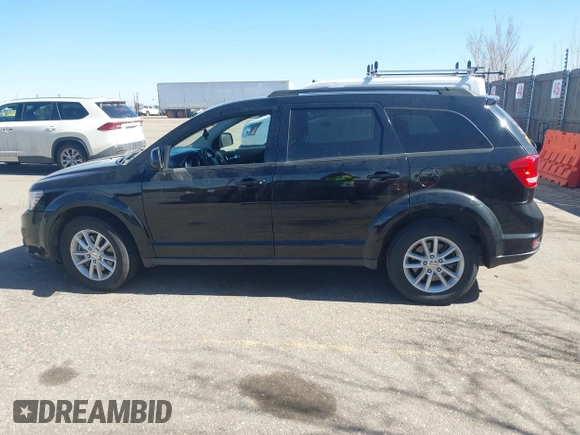 2016 Dodge Journey SXT with VIN 3C4PDDBG3GT215910, listed as a IAAI auction lot 41798779 with 165,505 mi miles. Bid and sale history available at carsss.com. Image 14.