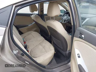 2013 Hyundai Accent GLS z VIN KMHCU4AE3DU580650, wystawiony jako IAAI lot #42479723 z przebiegiem 94 416 mil mil oraz . Historia ofert i sprzedaży dostępna na DreamBid. Obrazek 8.