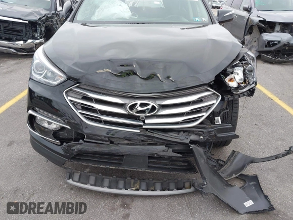 2018 Hyundai Santa Fe Ultimate with VIN 5XYZWDLA6JG570808, listed as a IAAI auction lot 41941878 with 47,391 mi miles and . Bid and sale history available at DreamBid. Image 6.