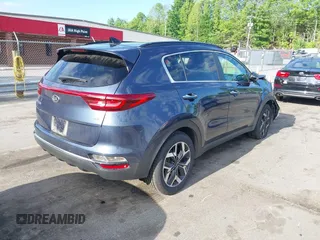 2021 Kia Sportage EX z VIN KNDPNCAC4M7897590, wystawiony jako IAAI lot #42183678 z przebiegiem 110 657 mil mil oraz . Historia ofert i sprzedaży dostępna na DreamBid. Obrazek 4.