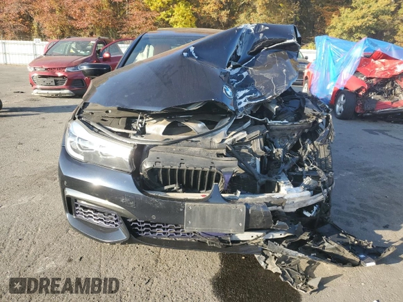 2018 BMW 7 Series 740i xDrive with VIN WBA7E4C53JGV23968, listed as a Copart auction lot 77244814 with 0 mi miles and Salvage Title. Bid and sale history available at carsss.com. Image 5.
