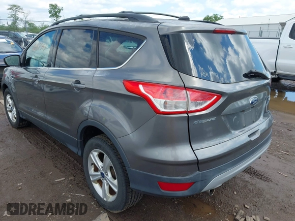 2013 Ford Escape SE with VIN 1FMCU9GX3DUD35255, listed as a IAAI auction lot 42197543 with 154,359 mi miles and . Bid and sale history available at DreamBid. Image 3.