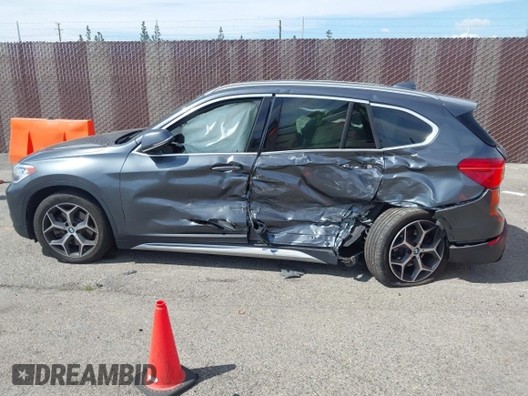 2018 BMW X1 xDrive28i with VIN WBXHT3C30J5L34702, listed as a IAAI auction lot 41935803 with 42,174 mi miles. Bid and sale history available at carsss.com. Image 14.