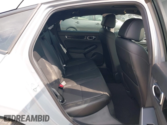 2025 Honda Civic Sport Touring z VIN 19XFL4H94SE000539, wystawiony jako IAAI lot #41777545 z przebiegiem 7 128 mil mil oraz . Historia ofert i sprzedaży dostępna na DreamBid. Obrazek 8.