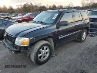 2006 GMC Envoy SLT with VIN 1GKDS13S662220064, listed as a Copart auction lot 84381274 with 237,220 mi miles and Salvage Title. Bid and sale history available at carsss.com. Image 1.