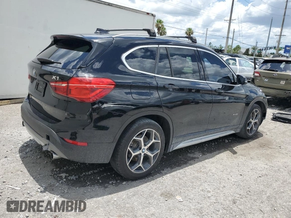2016 BMW X1 xDrive28i z VIN WBXHT3C34G5E54952, wystawiony jako Copart lot #60713485 z przebiegiem 69 395 mil mil oraz Szkoda całkowita • Salvage title. Historia ofert i sprzedaży dostępna na DreamBid. Obrazek 3.
