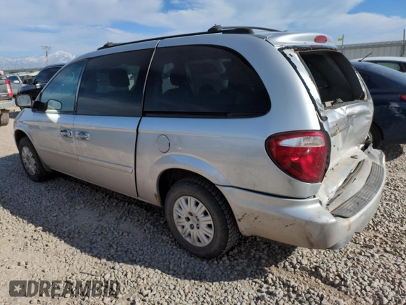 2005 Chrysler Town & Country LX with VIN 2C4GP44R25R483773, listed as a Copart auction lot 52019725 with 244,319 mi miles and Salvage Title. Bid and sale history available at DreamBid. Image 2.