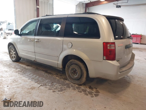 2010 Dodge Grand Caravan SE with VIN 2D4RN4DE8AR173359, listed as a IAAI auction lot 42170689 with 246,553 mi miles and . Bid and sale history available at DreamBid. Image 3.