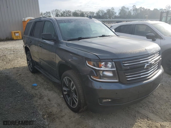 2019 Chevrolet Tahoe Premier with VIN 1GNSCCKJ4KR193590, listed as a Copart auction lot 74721004 with 93,710 mi miles and Salvage Title. Bid and sale history available at carsss.com. Image 4.