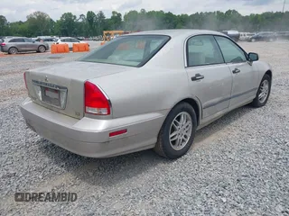 2002 Mitsubishi Diamante LS z VIN 6MMAP57P52T010479, wystawiony jako IAAI lot #42086895 z przebiegiem 89 977 mil mil oraz . Historia ofert i sprzedaży dostępna na DreamBid. Obrazek 4.