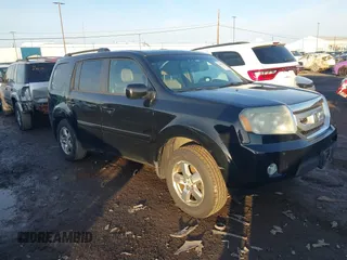 2009 Honda Pilot EX-L with VIN 5FNYF48659B012032, listed as a IAAI auction lot 41801232 with 205,636 mi miles and . Bid and sale history available at carsss.com. Image 1.