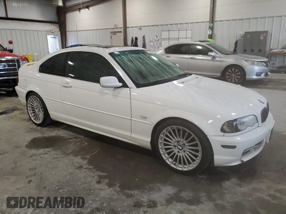 2002 BMW 3 Series 325Ci with VIN WBABN33472JW52750, listed as a Copart auction lot 79733074 with 188,991 mi miles and Salvage title. Bid and sale history available at DreamBid. Image 4.