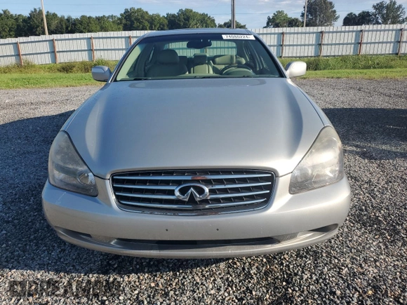2003 Infiniti Q45 z VIN JNKBF01A93M103010, wystawiony jako Copart lot #74080224 z przebiegiem 46 898 mil mil oraz Szkoda całkowita • Salvage title. Historia ofert i sprzedaży dostępna na DreamBid. Obrazek 5.