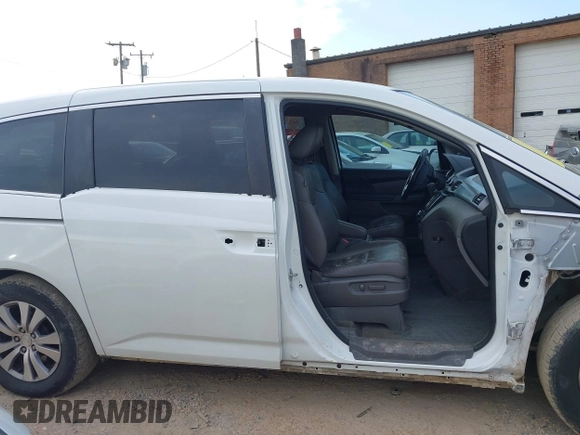 2015 Honda Odyssey EX-L z VIN 5FNRL5H61FB055684, wystawiony jako IAAI lot #42013480 z przebiegiem 221 381 mil mil oraz . Historia ofert i sprzedaży dostępna na DreamBid. Obrazek 14.