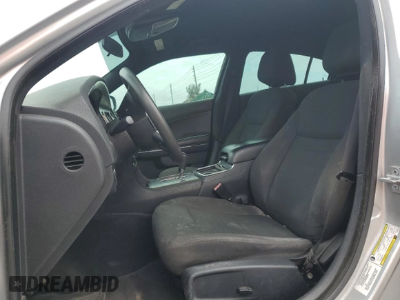 2012 Dodge Charger SE with VIN 2C3CDXBG4CH203207, listed as a Copart auction lot 56910395 with 156,016 mi miles and Salvage Title. Bid and sale history available at DreamBid. Image 7.