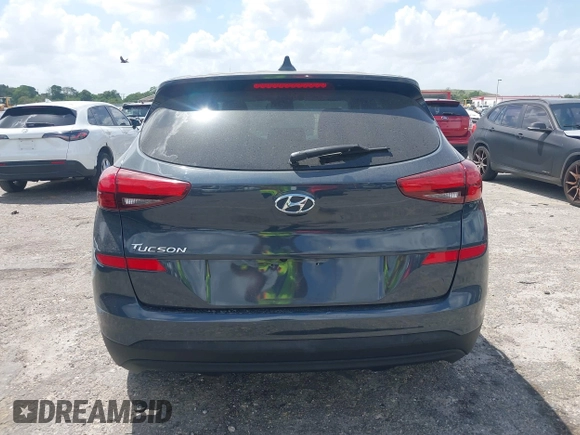 2021 Hyundai Tucson SE with VIN KM8J23A41MU291085, listed as a IAAI auction lot 41956974 with 93,932 mi miles. Bid and sale history available at carsss.com. Image 16.