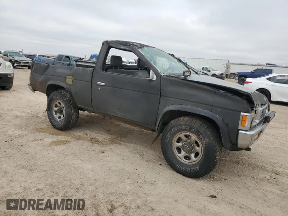 1995 Nissan Frontier XE with VIN 1N6SD11Y2SC308065, listed as a Copart auction lot 45282595 with 51,994 mi miles and Salvage title. Bid and sale history available at DreamBid. Image 4.
