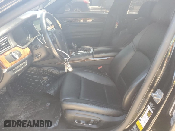 2014 BMW 7 Series 750i xDrive with VIN WBAYB6C52ED224536, listed as a Copart auction lot 54397595 with 107,410 mi miles and Salvage title. Bid and sale history available at DreamBid. Image 7.
