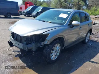 2013 Mazda CX-5 Grand Touring with VIN JM3KE4DE9D0137085, listed as a IAAI auction lot 41978534 with 103,720 mi miles and . Bid and sale history available at carsss.com. Image 18.
