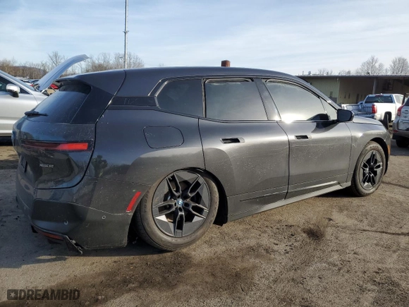 2024 BMW iX xDrive50 with VIN WB523CF02RCP06595, listed as a Copart auction lot 44179575 with 0 mi miles and Salvage Title. Bid and sale history available at carsss.com. Image 3.