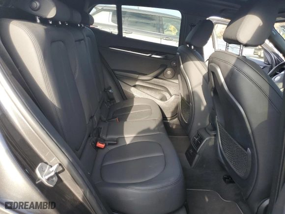 2021 BMW X2 xDrive28i with VIN WBXYJ1C07M5S21169, listed as a Copart auction lot 77829574 with 24,173 mi miles and Salvage Title. Bid and sale history available at carsss.com. Image 11.