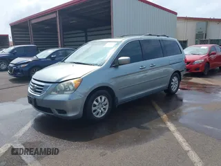 2010 Honda Odyssey EX-L with VIN 5FNRL3H6XAB061092, listed as a IAAI auction lot 41645143 with 165,941 mi miles. Bid and sale history available at carsss.com. Image 18.