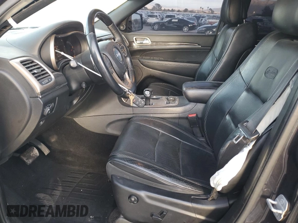 2014 Jeep Grand Cherokee Overland with VIN 1C4RJFCT4EC506790, listed as a Copart auction lot 47827675 with 163,511 mi miles and Salvage Title. Bid and sale history available at DreamBid. Image 7.