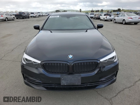 2018 BMW 5 Series 530i with VIN WBAJA5C51JWA38499, listed as a Copart auction lot 49150205 with 59,521 mi miles and Salvage Title. Bid and sale history available at DreamBid. Image 5.