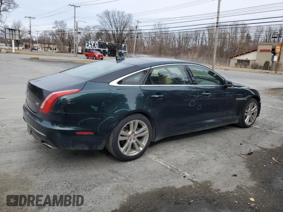 2016 Jaguar XJ Portfolio z VIN SAJWJ2GD0G8V92850, wystawiony jako Copart lot #47844065 z przebiegiem 99 652 mil mil oraz Szkoda całkowita • Salvage title. Historia ofert i sprzedaży dostępna na DreamBid. Obrazek 3.