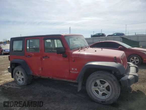 2009 Jeep Wrangler Unlimited X with VIN 1J4GZ39129L711934, listed as a Copart auction lot 47005105 with 423,135 mi miles and Salvage Title. Bid and sale history available at carsss.com. Image 4.