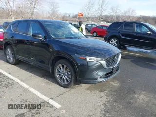 2024 Mazda CX-5 2.5 S Premium Package with VIN JM3KFBDM3R0400333, listed as a IAAI auction lot 41741454 with 14,116 mi miles. Bid and sale history available at carsss.com. Image 1.