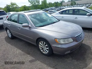 2006 Hyundai Azera SE with VIN KMHFC46F06A107049, listed as a IAAI auction lot 42638717 with 158,094 mi miles and . Bid and sale history available at DreamBid. Image 1.