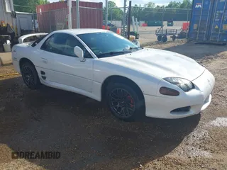 1998 Mitsubishi 3000GT with VIN JA3AM44HXWY004050, listed as a IAAI auction lot 42122143 with 122,286 mi miles and . Bid and sale history available at DreamBid. Image 1.