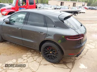 2017 Porsche Macan GTS with VIN WP1AG2A53HLB50635, listed as a IAAI auction lot 41665310 with 100,730 mi miles. Bid and sale history available at carsss.com. Image 3.