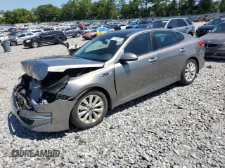 2016 Kia Optima EX with VIN 5XXGU4L32GG067952, listed as a Copart auction lot 57529155 with 123,828 mi miles and Salvage title. Bid and sale history available at DreamBid. Image 1.