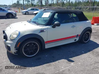 2010 MINI Convertible S with VIN WMWMS3C57ATY51245, listed as a IAAI auction lot 41802174 with 110,154 mi miles and . Bid and sale history available at DreamBid. Image 2.