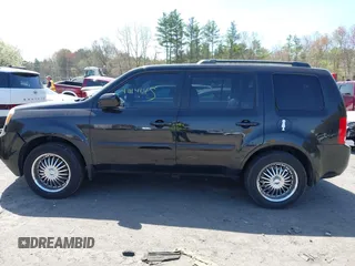 2013 Honda Pilot EX-L with VIN 5FNYF4H75DB002151, listed as a IAAI auction lot 42141451 with 223,651 mi miles and . Bid and sale history available at DreamBid. Image 14.