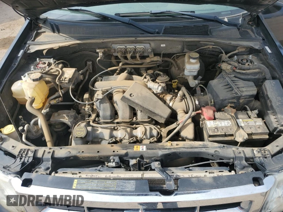 2008 Ford Escape XLT with VIN 1FMCU931X8KD85671, listed as a Copart auction lot 60652235 with 138,499 mi miles and Clean title. Bid and sale history available at DreamBid. Image 12.